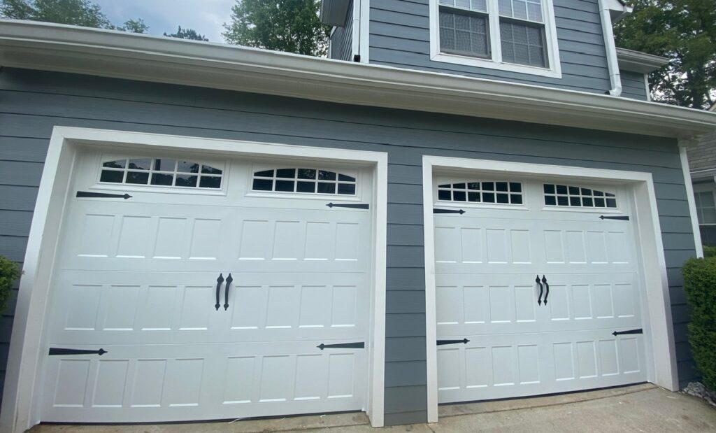 two white carriage style garage doors