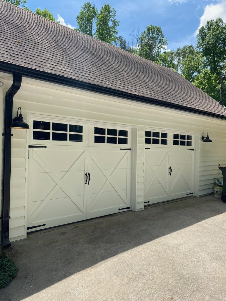white carriage house style garage doors